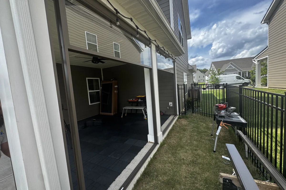 Glass porch enclosure installation underway Indian Trail NC