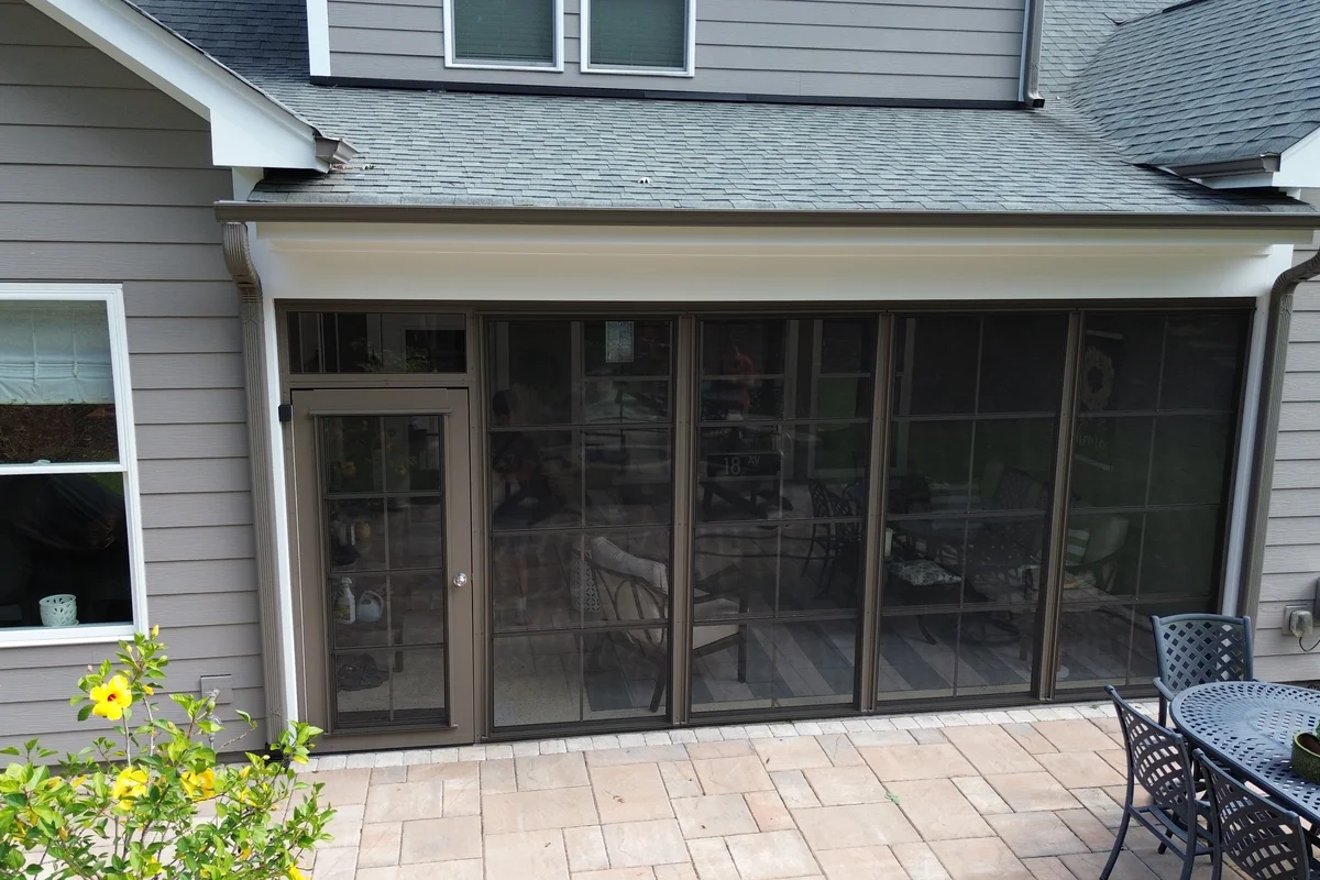 Finished 3-season vinyl-film porch enclosure exterior view in Belmont NC