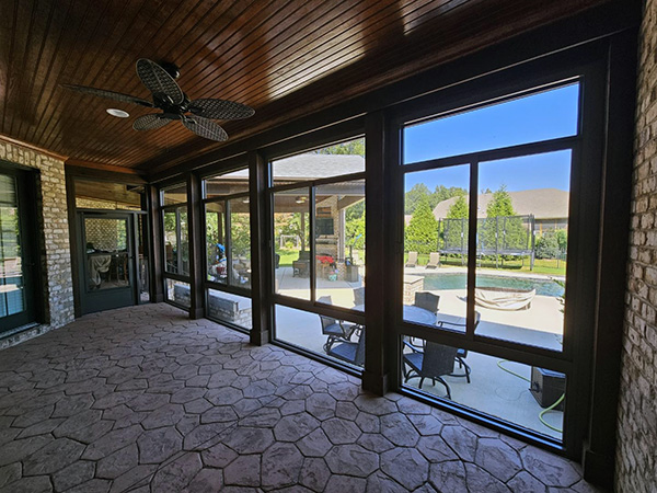 Interior view of completed single-pane glass porch enclosure