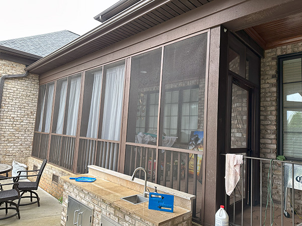 Waxhaw porch before single-pane glass slider enclosure installation