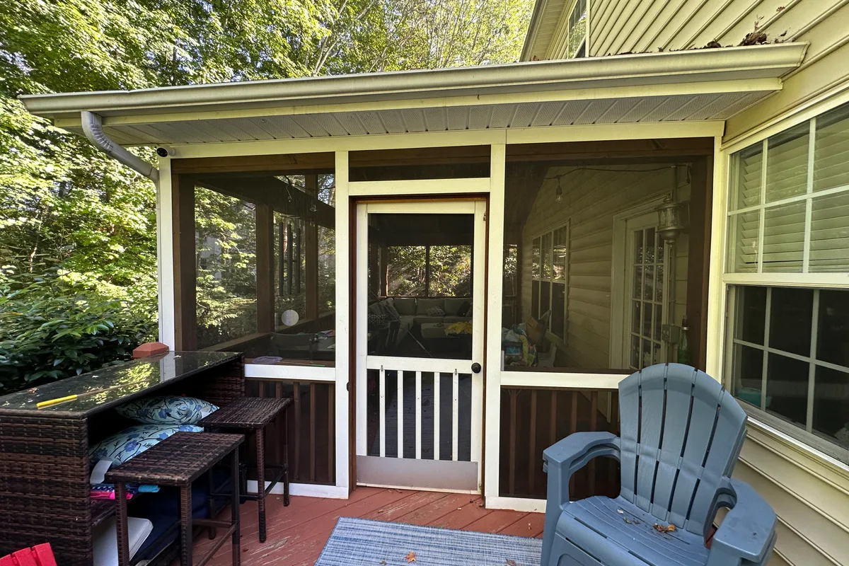 Existing porch structure before vinyl film enclosure installation in Charlotte NC