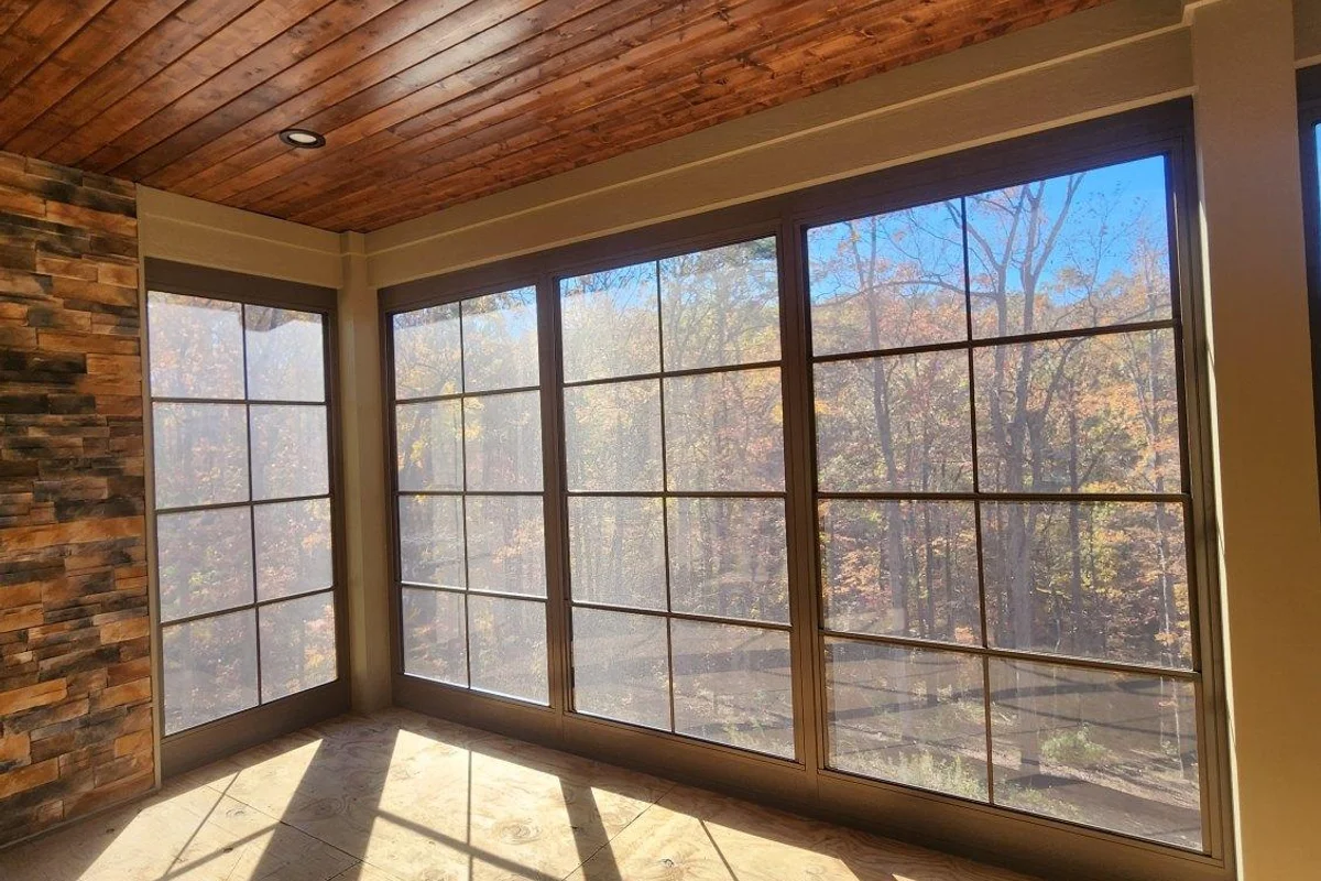 Finished 3-season vinyl film porch enclosure exterior Six Mile South Carolina