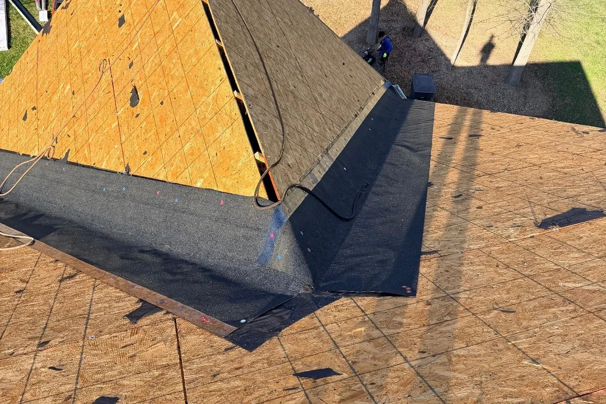 Roofing construction in progress in Riceland showing roof installation and repair work Charlotte NC